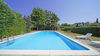 Single villa with large private garden and swimming pool a few steps from Porto Torchio in Manerba del Garda