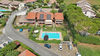 Appartamento al piano terra con doppio giardino in residence con piscina a Manerba del Garda