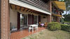 Appartamento al piano terra con doppio giardino in residence con piscina a Manerba del Garda