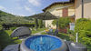 Apartment with private garden in a residence with swimming pool in Manerba del Garda