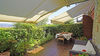 Spacious two-room ground floor apartment with porch and garden in Manerba del Garda