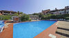 End-of-terrace two-bedroom apartment with large garden and garage in Manerba del Garda 
