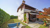 End-of-terrace two-bedroom apartment with large garden and garage in Manerba del Garda 