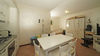 End-of-terrace two-bedroom apartment with large garden and garage in Manerba del Garda 
