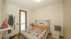End-of-terrace two-bedroom apartment with large garden and garage in Manerba del Garda 