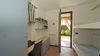 End-of-terrace two-bedroom apartment with large garden and garage in Manerba del Garda 