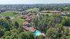 Two-bedroom apartment with dual private outdoor spaces and pool in Manerba del Garda