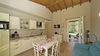 Two-bedroom apartment with dual private outdoor spaces and pool in Manerba del Garda
