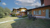 Two-bedroom apartment with dual private outdoor spaces and pool in Manerba del Garda