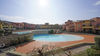 Spacious three-room apartment in renowned context with swimming pool a few steps from Porto Torchio in Manerba del Garda