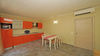 Spacious three-room ground floor apartment in residence with swimming pool in Manerba del Garda