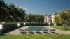Spacious three-room apartment with garden in newly built residence in Manerba del Garda