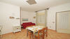 Two-room ground floor apartment with garden in residence with pier in Manerba del Garda