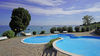 Appartamento in residence con piscina fronte lago