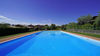 Villa a schiera di testa con giardino privato e garage doppio, in residence con piscina