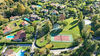 Detached villa with garden and terrace overlooking the lake, in an exclusive setting with swimming pool and tennis court, for sale in San Felice del Benaco