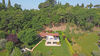 Detached villa with garden and terrace overlooking the lake, in an exclusive setting with swimming pool and tennis court, for sale in San Felice del Benaco