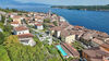 Prestigious two-room apartment with private courtyard and garage, for sale in the center of Salò