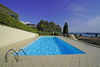 Three-room apartment with lake view balcony in residence with swimming pool for sale in Gardone Riviera