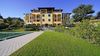 Two-room apartment with private courtyard and garage, in a well-maintained residence with swimming pool overlooking the lake, in Gardone Riviera for sale