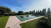 Two-room apartment with private courtyard and garage, in a well-maintained residence with swimming pool overlooking the lake, in Gardone Riviera for sale