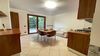 Two-room apartment with private courtyard and garage, in a well-maintained residence with swimming pool overlooking the lake, in Gardone Riviera for sale