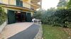 Two-room apartment with private courtyard and garage, in a well-maintained residence with swimming pool overlooking the lake, in Gardone Riviera for sale