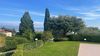 Two-room apartment with private courtyard and garage, in a well-maintained residence with swimming pool overlooking the lake, in Gardone Riviera for sale