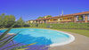 Three-room apartment with exclusive living terrace and garage, in residence with pool in Portese for Sale