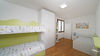 Three-room apartment with exclusive living terrace and garage, in residence with pool in Portese for Sale