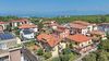 In the heart of Peschiera del Garda, elegant Portion of two-family villa for sale