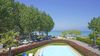 Punta Grò, Sirmione, lake view apartment with private parking space for sale