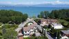 Punta Grò, Sirmione, lake view apartment with private parking space for sale