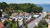 Punta Grò, Sirmione, lake view apartment with private parking space for sale