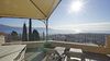 Two-room flat with panoramic terraces and spectacular lake views in a residence with swimming pool
