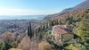 Two-room flat with panoramic terraces and spectacular lake views in a residence with swimming pool