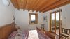 Wonderful renovated country house with lake view, set in a large olive grove.