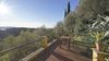 Wonderful renovated country house with lake view, set in a large olive grove.