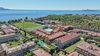 Spacious three-room apartment to customize in the residential center of Toscolano Maderno