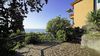 Two-room apartment with panoramic terrace and stunning lake view in residence with swimming pool