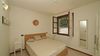 One-bedroom apartment with lake view in a residence with pool