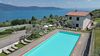 One-bedroom apartment with lake view in a residence with pool