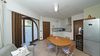 Three-Room Apartment with Private Courtyard, Swimming Pool and Sauna Just Steps from the Lake in Bogliaco di Gargnano.