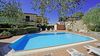 Three-Room Apartment with Private Courtyard, Swimming Pool and Sauna Just Steps from the Lake in Bogliaco di Gargnano.